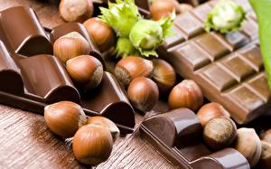 Картинки Сладости Шоколад Орехи Фундук Продукты питания