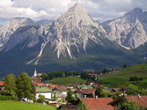 Картинки Австрия Облачно Городок в горах Города