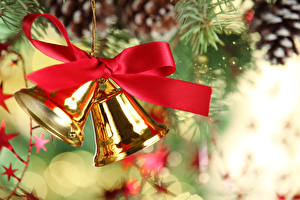 Фотография Праздники Новый год Колокольчик Шишки колокольчики на елку