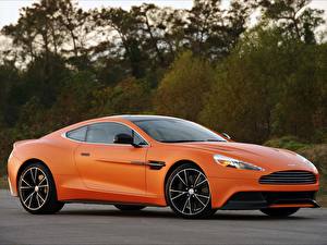 Картинка Aston Martin Оранжевый Aston Vanquish автомобиль
