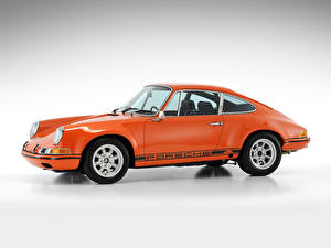 Фотографии Porsche Оранжевые 1970 Porsche 911 2.3 ST Coupe машина