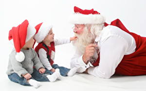 Фотография Праздники Рождество Мальчишка В шапке Санта-Клаус Борода