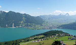 Фотография Швейцария Горы Небо Озеро Сверху Эмметтен город