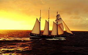 Картинка Корабль Парусные Море Рассвет и закат Небо Горизонт