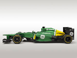 Обои для рабочего стола Формула 1 Сбоку Зеленый Caterham CT03 автомобиль