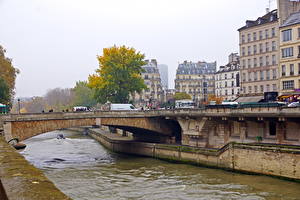 Обои для рабочего стола Франция Река Мосты Водный канал Париж город
