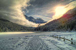 Картинки Пейзаж Австрия Гора Леса Небо Снеге Облачно HDR Альп Природа
