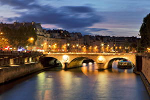 Фото Франция Мосты Реки Ночь Уличные фонари Сена Париж город