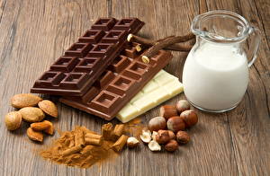 Картинка Натюрморт Орехи Молоко Шоколад Лесной орех Шоколадная плитка Еда